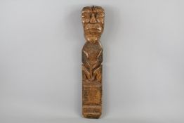 A Wood Carved Wall-Mounted Fertility Figure