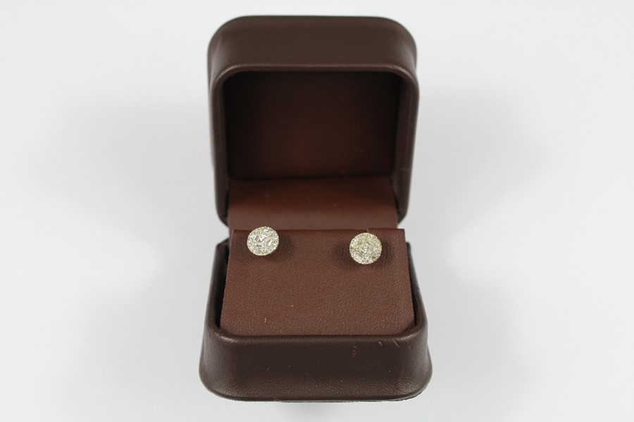 A Pair of Lady's 14ct Gold Diamond Stud Earrings