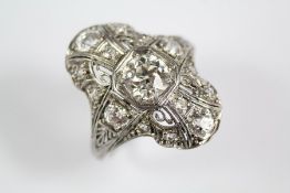 A Platinum Art Deco Filigree Diamond Ring