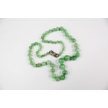 A Chinese Graduated Jade Necklace