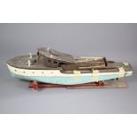 A Vintage Mechanical Toy Boat