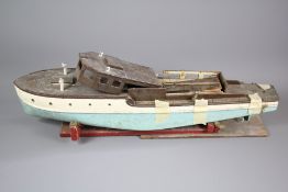 A Vintage Mechanical Toy Boat