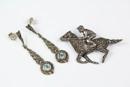 A Silver and Marcasite Jockey Brooch