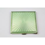 A Silver and Green Enamel Cigarette Case