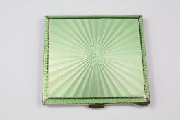 A Silver and Green Enamel Cigarette Case