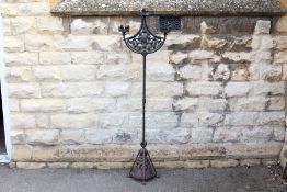 A Cast Iron Candle Stand