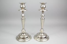 A Pair of Silver-Plated Candlesticks