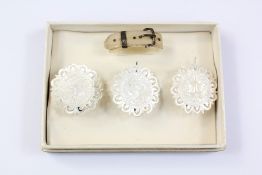 A Set of Three Mother of Pearl Buttons