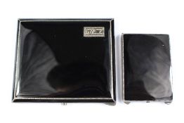 A Continental Silver and Black Enamel Cigarette Case and Match Box