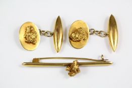 A Gentleman's Pair of 14ct Gold Nugget Cufflinks and Tie Stick