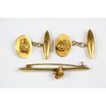 A Gentleman's Pair of 14ct Gold Nugget Cufflinks and Tie Stick