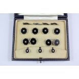A Set of Gentleman's 9ct White Gold Onyx and Pearl Dress Studs