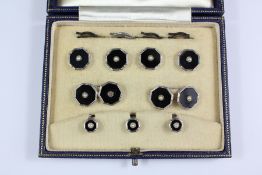 A Set of Gentleman's 9ct White Gold Onyx and Pearl Dress Studs