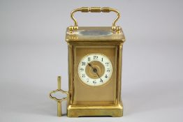 An Antique Brass Carriage Clock