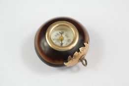 A Late Victorian 9ct Gold Mounted Nut Compass