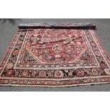 A Large Woollen Persian Carpet