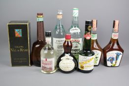 Nine Bottles of Varying Types of Grappa
