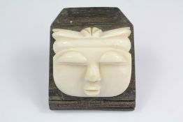 A Carved Pre-1947 Ivory Mask