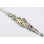 An Art Deco Platinum and Diamond Cocktail Watch Bracelet