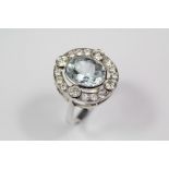 A Lady's Platinum Aquamarine and Diamond Ring