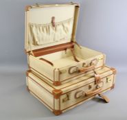 A Set of Deluxe His 'n Hers Linea Golf Tanned Leather Suitcases