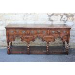 An Oak Bylaws Knell Dresser Sideboard