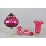 A Collection of Cranberry Glassware