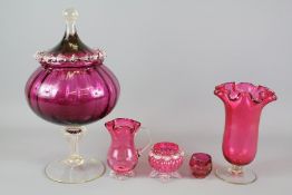 A Collection of Cranberry Glassware