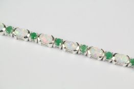 A Silver Opal and Emerald Bracelet