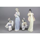 Four Porcelain Figurines