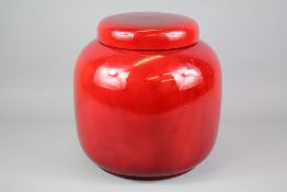 A Royal Doulton Flambe Ginger Jar and Domed Cover