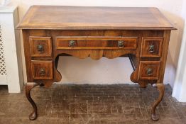 A Walnut and Mahogany Inlaid Sideboard