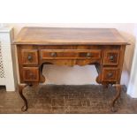 A Walnut and Mahogany Inlaid Sideboard