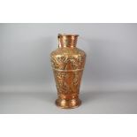 An Arts and Crafts Copper Ewer