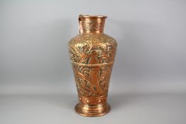 An Arts and Crafts Copper Ewer