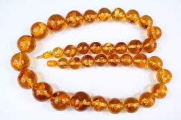 A Graded Bead Amber Necklace