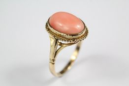 A Lady's 9ct Yellow Gold and Coral Ring