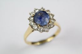 A Lady's 18ct Yellow Gold Cornflower Blue Sapphire and Diamond Ring