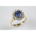 A Lady's 18ct Yellow Gold Cornflower Blue Sapphire and Diamond Ring