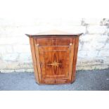 A Mahogany Corner Cupboard