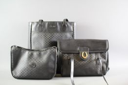 A Gucci Navy Handbag Trio