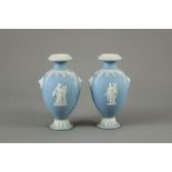 A Pair of Wedgwood Urns