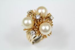 A Lady's 14ct Yellow Gold Stylistic Diamond and Pearl Ring