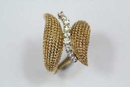 A Lady's 14 ct Yellow Gold and Diamond Cocktail Ring