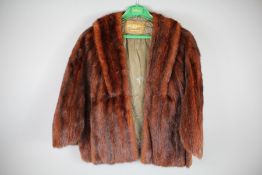 A Lady's Red Mink Short Cape