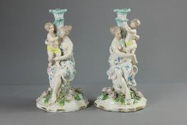 Two Continental Porcelain Candle Sticks