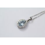 An 18ct White Gold Tear-Drop Aquamarine and Diamond Pendant Necklace