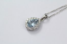 An 18ct White Gold Tear-Drop Aquamarine and Diamond Pendant Necklace