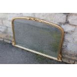 A Large Bevelled Overmantel Mirror