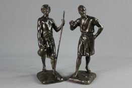 A Pair of Patinated Metal Figures